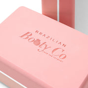 Brazilian Booty Co pink yoga block and fitness accessory