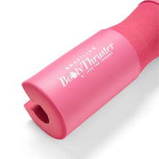 Comfortable pink barbell pad hip thrust workouts.